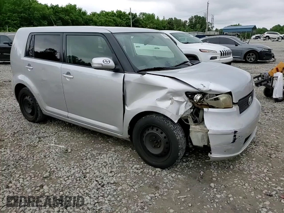 2009 Scion xB z VIN JTLKE50E591067708, wystawiony jako Copart lot #56297005 z przebiegiem 206 638 mil mil oraz Szkoda całkowita • Salvage title. Historia ofert i sprzedaży dostępna na DreamBid. Obrazek 13.