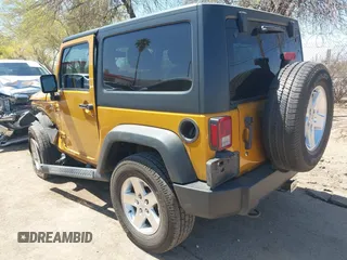 2014 Jeep Wrangler Sport with VIN 1C4AJWAG5EL223883, listed as a IAAI auction lot 42002814 with 134,361 mi miles and . Bid and sale history available at carsss.com. Image 3.