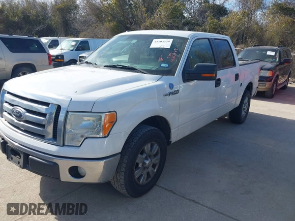 2012 Ford F-150 XL with VIN 1FTFW1CF9CFA94640, listed as a IAAI auction lot 41703729 with 216,291 mi miles. Bid and sale history available at carsss.com. Image 21.