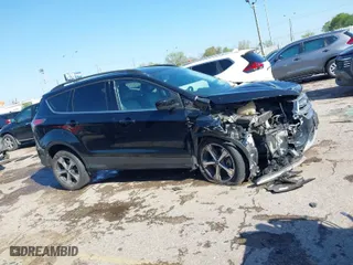 2017 Ford Escape SE with VIN 1FMCU0G98HUA80962, listed as a IAAI auction lot 41859621 with 78,611 mi miles. Bid and sale history available at carsss.com. Image 13.