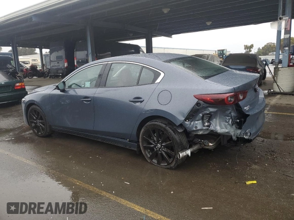 2025 Mazda 3 S Carbon Edition with VIN JM1BPBCM3S1767854, listed as a Copart auction lot 43643335 with 1,065 mi miles and Salvage Title. Bid and sale history available at DreamBid. Image 2.