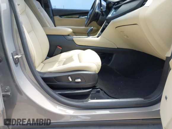 2018 Cadillac XT5 FWD with VIN 1GYKNARS5JZ145739, listed as a IAAI auction lot 42443337 with 50,917 mi miles and . Bid and sale history available at DreamBid. Image 5.