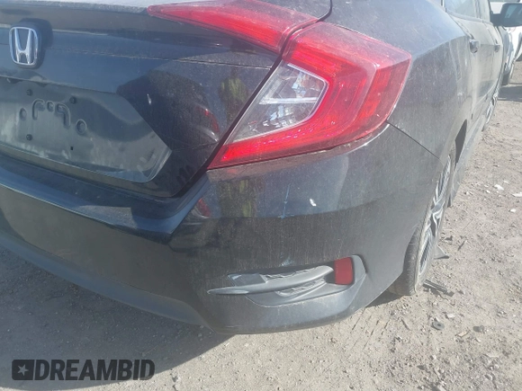 2016 Honda Civic EX-T z VIN 2HGFC1F3XGH630558, wystawiony jako IAAI lot #41868334 z przebiegiem 154 452 mil mil oraz . Historia ofert i sprzedaży dostępna na DreamBid. Obrazek 18.