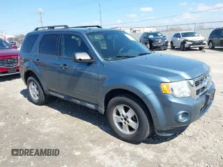 2010 Ford Escape XLT with VIN 1FMCU0DGXAKD37821, listed as a IAAI auction lot 42002767 with 169,557 mi miles. Bid and sale history available at carsss.com. Image 1.