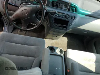 2000 Honda Odyssey EX with VIN 2HKRL1860YH532814, listed as a Copart auction lot 51780855 with 186,328 mi miles and Salvage Title. Bid and sale history available at DreamBid. Image 8.