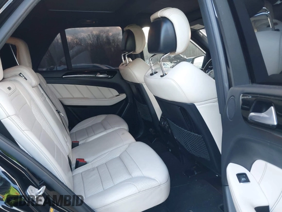 2014 Mercedes-Benz M 63 AMG z VIN 4JGDA7EBXEA306024, wystawiony jako IAAI lot #41452811 z przebiegiem 98 510 mil mil oraz . Historia ofert i sprzedaży dostępna na DreamBid. Obrazek 8.