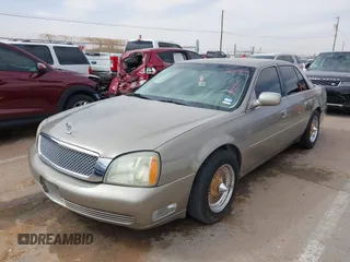 2003 Cadillac DeVille z VIN 1G6KD54Y63U223640, wystawiony jako IAAI lot #41704549 z przebiegiem 127 981 mil mil oraz . Historia ofert i sprzedaży dostępna na DreamBid. Obrazek 2.