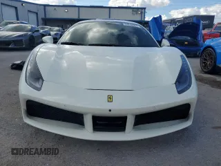 2016 Ferrari 488 z VIN ZFF79ALAXG0216223, wystawiony jako Copart lot #74210804 z przebiegiem Nie podano mil oraz Szkody całkowita. Historia ofert i sprzedaży dostępna na DreamBid. Obrazek 5.