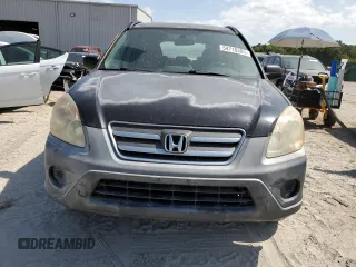2005 Honda CR-V LX with VIN JHLRD68505C007344, listed as a Copart auction lot 54710305 with 148,976 mi miles and Salvage Title. Bid and sale history available at DreamBid. Image 5.