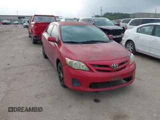 2011 Toyota Corolla L with VIN 2T1BU4EE2BC601203, listed as a IAAI auction lot 41913651 with 180,942 mi miles. Bid and sale history available at carsss.com. Image 1.