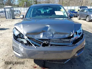 2014 Volkswagen Tiguan SE z VIN WVGAV3AX0EW511694, wystawiony jako IAAI lot #41811345 z przebiegiem 95 129 mil mil oraz . Historia ofert i sprzedaży dostępna na DreamBid. Obrazek 6.