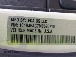 2021 Jeep Grand Cherokee Laredo E with VIN 1C4RJFAG7MC620710, listed as a IAAI auction lot 42255694 with 51,989 mi miles and . Bid and sale history available at DreamBid. Image 9.