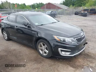 2014 Kia Optima LX z VIN 5XXGM4A7XEG283874, wystawiony jako IAAI lot #42592852 z przebiegiem 180 806 mil mil oraz . Historia ofert i sprzedaży dostępna na DreamBid. Obrazek 1.