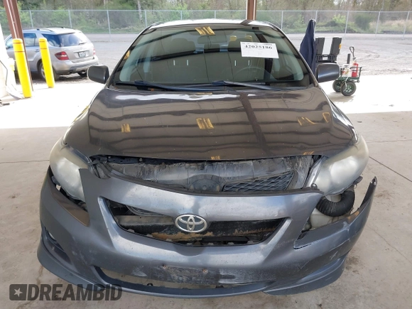 2009 Toyota Corolla with VIN 1NXBU40E29Z028660, listed as a IAAI auction lot 42025186 with 218,285 mi miles. Bid and sale history available at carsss.com. Image 12.