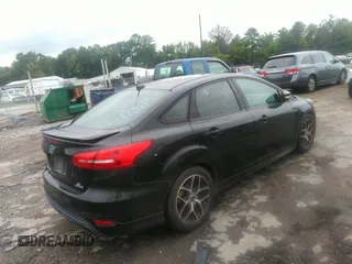 2015 Ford Focus SE with VIN 1FADP3F27FL304883, listed as a IAAI auction lot 42688252 with 90,590 mi miles and . Bid and sale history available at DreamBid. Image 4.