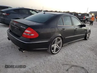 2005 Mercedes-Benz E-Class 5.5L AMG with VIN WDBUF76J05A675937, listed as a Copart auction lot 77349524 with 0 mi miles and Salvage Title. Bid and sale history available at carsss.com. Image 3.
