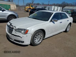 2013 Chrysler 300 with VIN 2C3CCAAG0DH508643, listed as a IAAI auction lot 41765128 with 203,871 mi miles. Bid and sale history available at carsss.com. Image 2.