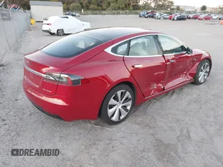 2020 Tesla Model S Long Range with VIN 5YJSA1E26LF390856, listed as a IAAI auction lot 41013728 with 54,985 mi miles. Bid and sale history available at carsss.com. Image 4.