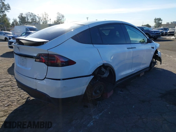 2022 Tesla Model X with VIN 7SAXCBE56NF329657, listed as a IAAI auction lot 41400629 with Not Provided miles and . Bid and sale history available at DreamBid. Image 4.
