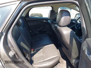 2014 Ford Focus Titanium with VIN 1FADP3N22EL317007, listed as a IAAI auction lot 42641134 with 159,705 mi miles and . Bid and sale history available at DreamBid. Image 8.
