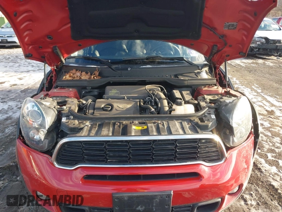2013 MINI Countryman S z VIN WMWZC3C58DWP22372, wystawiony jako IAAI lot #41523123 z przebiegiem 50 410 mil mil oraz . Historia ofert i sprzedaży dostępna na DreamBid. Obrazek 10.