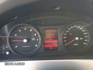 2009 Pontiac G8 with VIN 6G2ER57749L235662, listed as a Copart auction lot 73972344 with 146,384 mi miles and Salvage Title. Bid and sale history available at DreamBid. Image 9.
