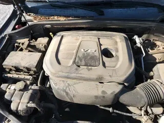 2018 Jeep Grand Cherokee Sterling z VIN 1C4RJFBG6JC259111, wystawiony jako Copart lot #61657125 z przebiegiem 134 642 mil mil oraz Czysty tytuł • Clean title. Historia ofert i sprzedaży dostępna na DreamBid. Obrazek 14.