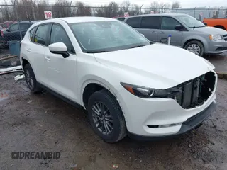 2019 Mazda CX-5 Sport with VIN JM3KFBBM2K0629966, listed as a IAAI auction lot 41953702 with 48,496 mi miles and . Bid and sale history available at carsss.com. Image 1.