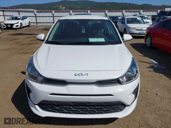 2022 Kia Rio S with VIN 3KPA24AD2NE473968, listed as a IAAI auction lot 42170326 with 42,676 mi miles and . Bid and sale history available at DreamBid. Image 12.