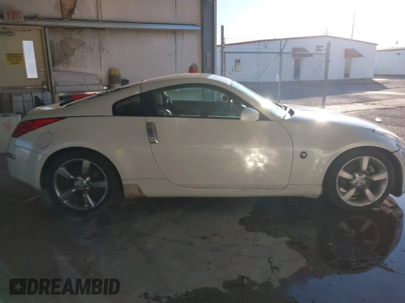 2006 Nissan 350Z Touring z VIN JN1AZ34D86M307042, wystawiony jako IAAI lot #41016528 z przebiegiem 124 303 mil mil oraz . Historia ofert i sprzedaży dostępna na DreamBid. Obrazek 13.