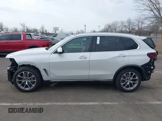 2025 BMW X5 xDrive40i with VIN 5UX23EU06S9W52867, listed as a IAAI auction lot 41726171 with 5,123 mi miles. Bid and sale history available at carsss.com. Image 14.