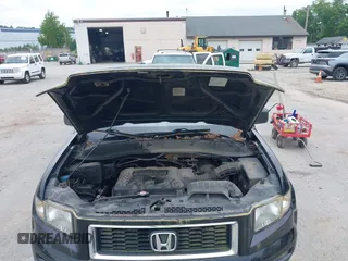 2007 Honda Ridgeline RTX z VIN 2HJYK16317H545839, wystawiony jako IAAI lot #42446190 z przebiegiem 183 600 mil mil oraz . Historia ofert i sprzedaży dostępna na DreamBid. Obrazek 10.