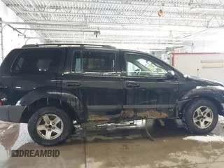 2005 Dodge Durango SXT with VIN 1D4HB38N15F610902, listed as a IAAI auction lot 41599584 with 175,661 mi miles and . Bid and sale history available at DreamBid. Image 6.