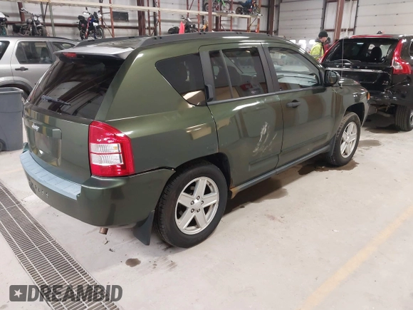 2008 Jeep Compass Sport with VIN 1J8FF47W28D534267, listed as a IAAI auction lot 42009243 with 122,720 mi miles and . Bid and sale history available at carsss.com. Image 4.