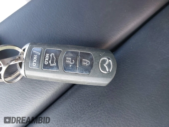 2016 Mazda CX-9 Grand Touring with VIN JM3TCADY5G0120033, listed as a IAAI auction lot 42248488 with 150,044 mi miles and . Bid and sale history available at DreamBid. Image 11.