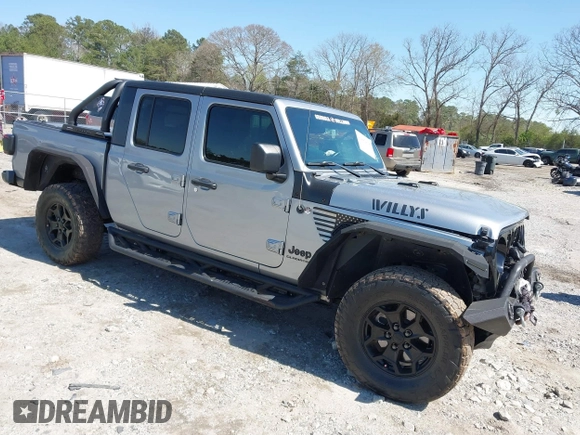 2021 Jeep Gladiator Freedom with VIN 1C6HJTAG3ML540967, listed as a IAAI auction lot 41883858 with 92,287 mi miles and . Bid and sale history available at DreamBid. Image 1.