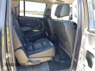2016 Chevrolet Suburban LT z VIN 1GNSCHKC3GR313126, wystawiony jako IAAI lot #41743640 z przebiegiem 178 351 mil mil oraz . Historia ofert i sprzedaży dostępna na DreamBid. Obrazek 8.