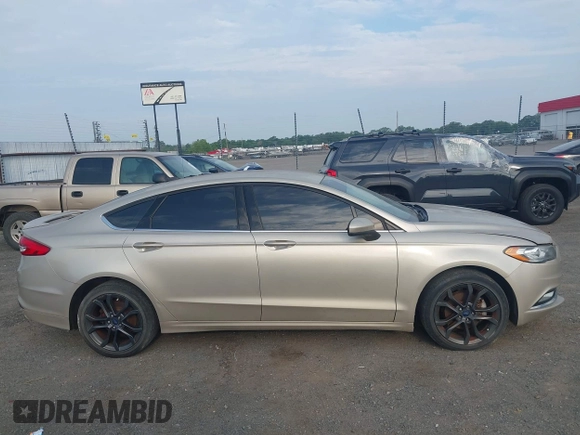 2018 Ford Fusion SE z VIN 3FA6P0HD6JR279927, wystawiony jako IAAI lot #42430172 z przebiegiem 145 080 mil mil oraz . Historia ofert i sprzedaży dostępna na DreamBid. Obrazek 13.