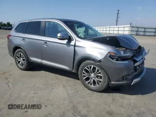 2018 Mitsubishi Outlander ES z VIN JA4AZ3A34JJ003445, wystawiony jako Copart lot #55850775 z przebiegiem 133 644 mil mil oraz Szkoda całkowita • Salvage title. Historia ofert i sprzedaży dostępna na DreamBid. Obrazek 4.