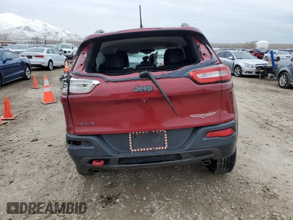 2014 Jeep Cherokee Trailhawk with VIN 1C4PJMBS6EW310871, listed as a Copart auction lot 49439665 with 0 mi miles and Salvage Title. Bid and sale history available at carsss.com. Image 6.
