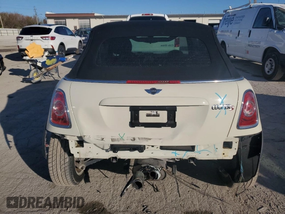 2015 MINI Convertible S with VIN WMWZP3C52FT708377, listed as a Copart auction lot 79817344 with 54,466 mi miles and Salvage title. Bid and sale history available at DreamBid. Image 6.