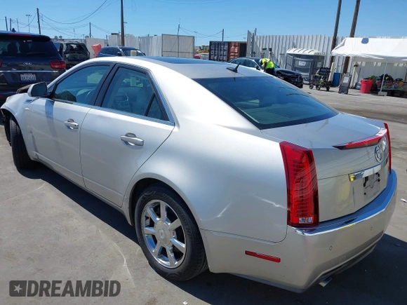 2008 Cadillac CTS RWD with VIN 1G6DM577280111413, listed as a IAAI auction lot 42238643 with 114,706 mi miles and . Bid and sale history available at DreamBid. Image 3.