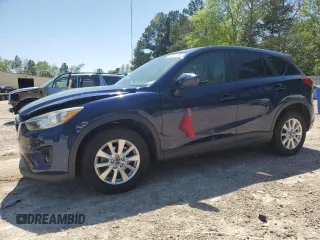2014 Mazda CX-5 Touring z VIN JM3KE4CYXE0308228, wystawiony jako Copart lot #52577755 z przebiegiem 143 234 mil mil oraz Szkody całkowita. Historia ofert i sprzedaży dostępna na DreamBid. Obrazek 1.