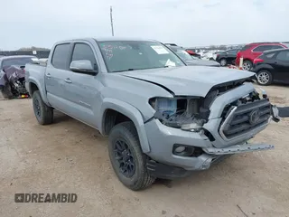2021 Toyota Tacoma 4WD SR with VIN 5TFCZ5AN3MX260853, listed as a IAAI auction lot 41784451 with 122,244 mi miles. Bid and sale history available at carsss.com. Image 1.