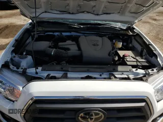2023 Toyota Tacoma SR5 z VIN 3TMAZ5CN3PM219718, wystawiony jako Copart lot #55253845 z przebiegiem 18 879 mil mil oraz Szkody całkowita. Historia ofert i sprzedaży dostępna na DreamBid. Obrazek 11.