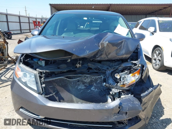 2016 Honda Odyssey SE with VIN 5FNRL5H33GB125693, listed as a IAAI auction lot 41994036 with 163,617 mi miles and . Bid and sale history available at DreamBid. Image 13.