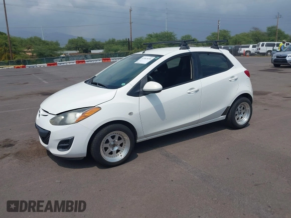2014 Mazda 2 Sport z VIN JM1DE1KY9E0181733, wystawiony jako IAAI lot #41907658 z przebiegiem 143 301 mil mil oraz . Historia ofert i sprzedaży dostępna na DreamBid. Obrazek 2.