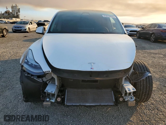 2023 Tesla Model Y Long Range with VIN 7SAYGDEE9PA129876, listed as a Copart auction lot 41819605 with 36,110 mi miles and Salvage Title. Bid and sale history available at DreamBid. Image 5.