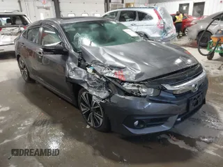 2016 Honda Civic Sedan EX-T with VIN 2HGFC1F31GH657163, listed as a IAAI auction lot 41386499 with 91,811 mi miles. Bid and sale history available at carsss.com. Image 1.