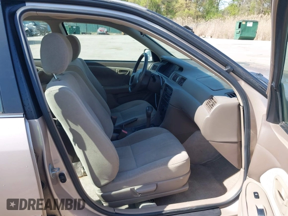 2001 Toyota Camry CE with VIN 4T1BG22K11U114688, listed as a IAAI auction lot 42065715 with 150,181 mi miles. Bid and sale history available at carsss.com. Image 5.